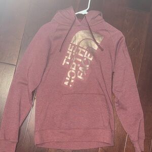 The North Face Burgundy Hoodie with Metallic Logo